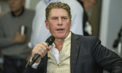 Texas canidate Bo French speaking at an event while holding a microphone